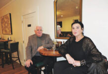 
			
				                                DCCA members Debbie Plummmer, owner of Dalton Central, and her husband David sit and eat together at mixer.
                                 Ben Freda | For Abington Journal

			
		