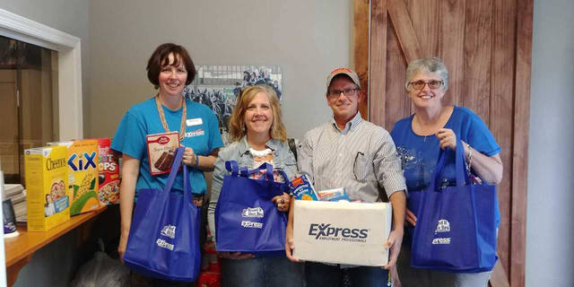 Express Employment Professionals Donate To Crossroads Church Food