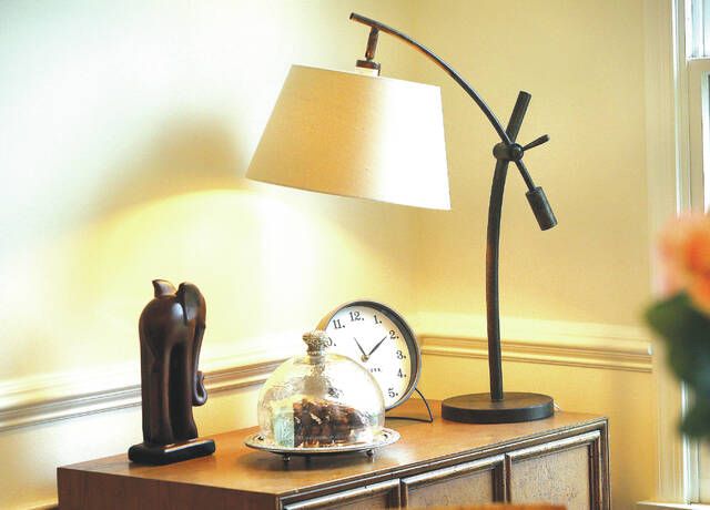 <p>A lamp sits on top of a chest in the corner of the newly remodeled formal dinning room.</p>
                                 <p>Fred Adams | For Abington Journal</p>