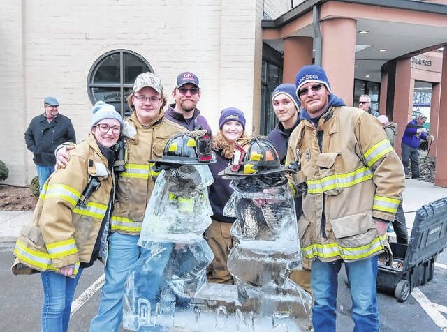 <p>Dalton Fire Company Station 5 competes in the firefighter carving competition. They made an ice sculpture of two Easter Island heads. From left, are Michaelene Kulig, Steven Richmond, Brent Tripp, Kayla Wood, Colton Lenz and Dale Richmond Jr.</p>
                                 <p>Ben Freda | For Abington Journal</p>